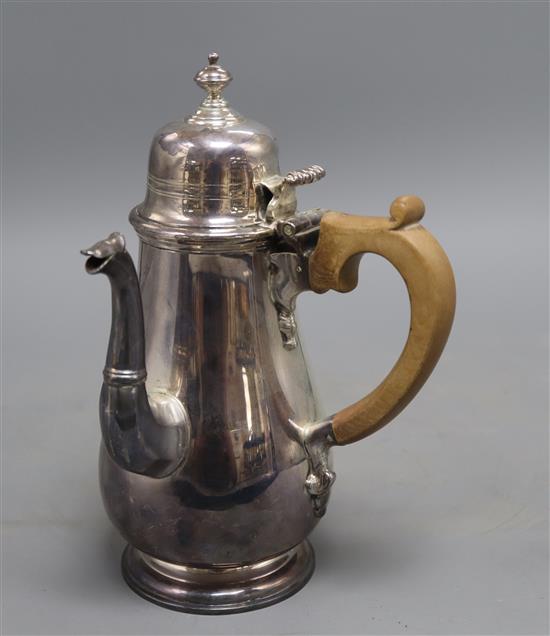 A George V silver baluster chocolate pot, by Searle & Co, London, 1930, 22.8cm, gross 20 oz.